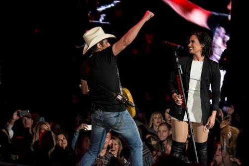 DEMI LOVATO MAKES SURPRISE APPEARANCE AT BRAD PAISLEY’S  IRVINE, CA SHOW